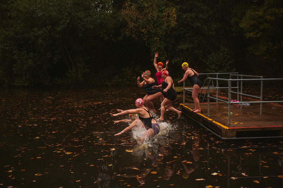 Wild Swimming Womens Group Autumnal Swim #2 Photograph by Hollie Fernando