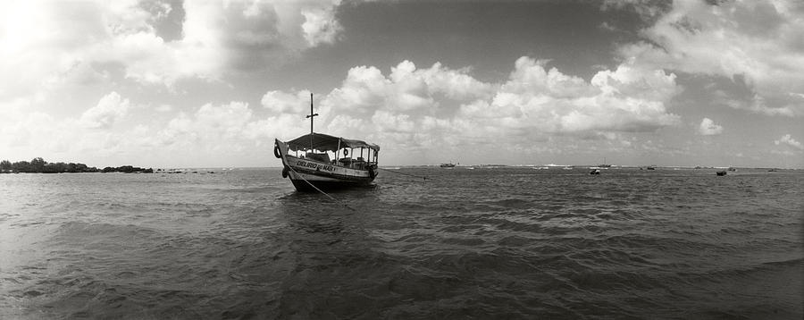 Black And White Photograph - Wooden Boat In The Ocean, Morro De Sao #2 by Panoramic Images