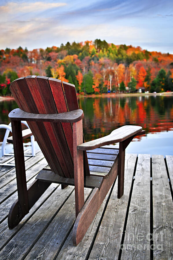 Wooden dock with chairs on autumn lake Photograph by Elena Elisseeva