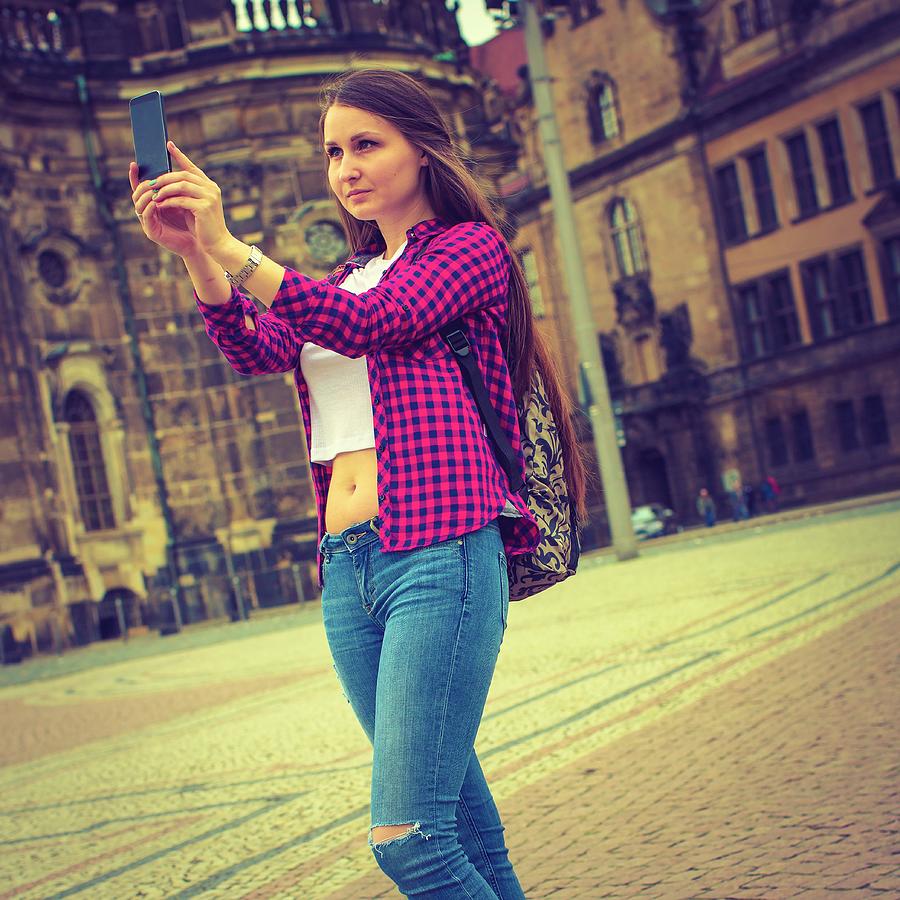 Young Woman Taking Photo Of Herself #2 Photograph by Wladimir Bulgar/science Photo Library