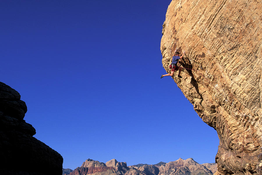 A Male Rock Climber Climbing Photograph By Corey Rich Fine Art America