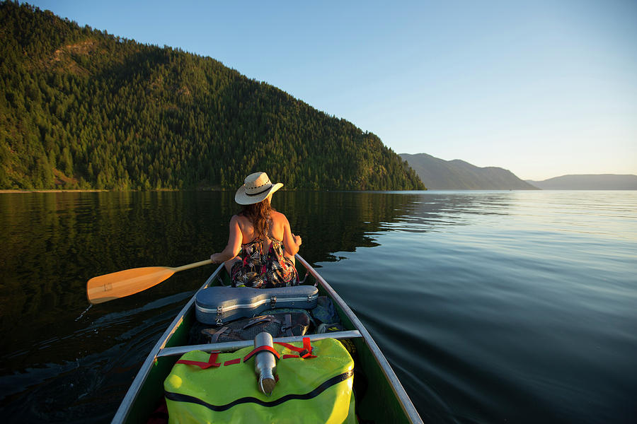 Adult Woman Canoeing Down A River Photograph by Woods Wheatcroft - Fine ...