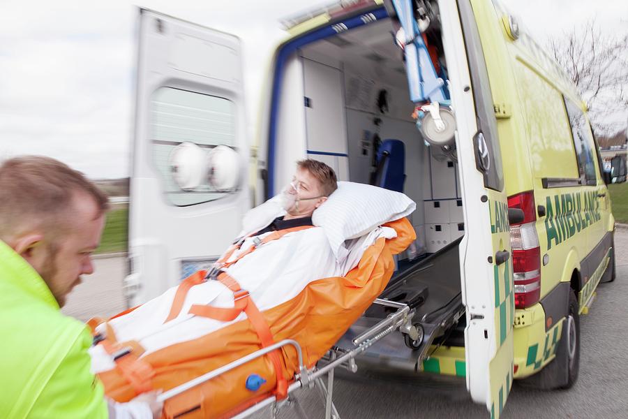 Cardiac Patient In An Ambulance Photograph by Thomas Fredberg/science ...