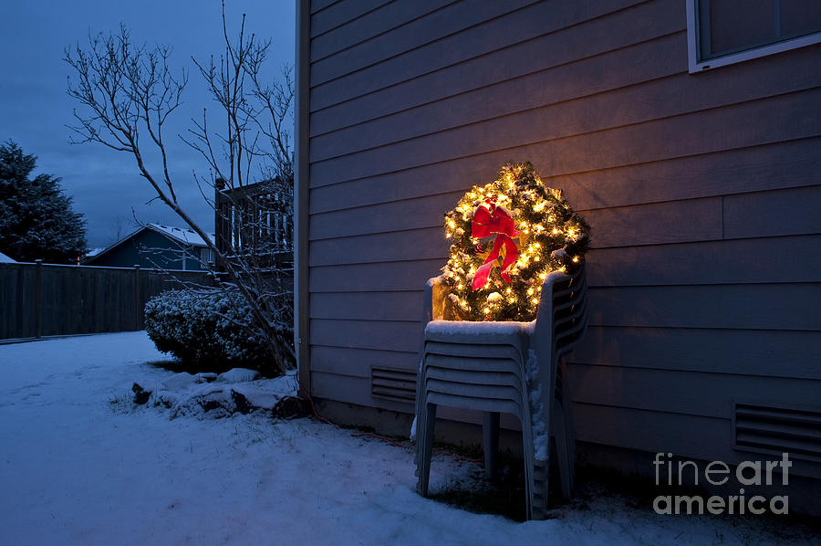 Christmas wreath on lawn chairs with snow #3 Photograph by Jim Corwin