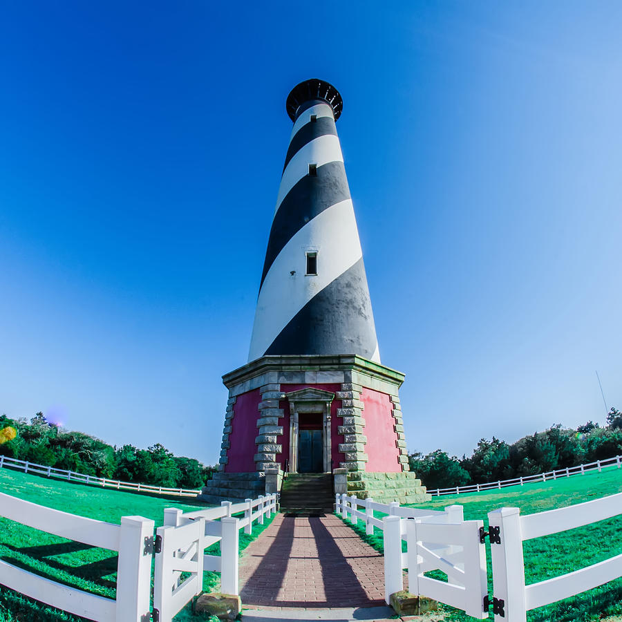 Diagonal black and white stripes mark the Cape Hatteras lighthou #3 Photograph by Alex Grichenko
