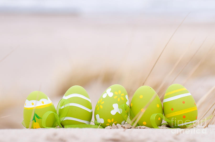 Easter decorated eggs on sand #3 Photograph by Michal Bednarek
