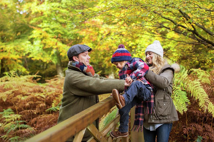 Family In Woods In Autumn Photograph by Science Photo Library | Fine