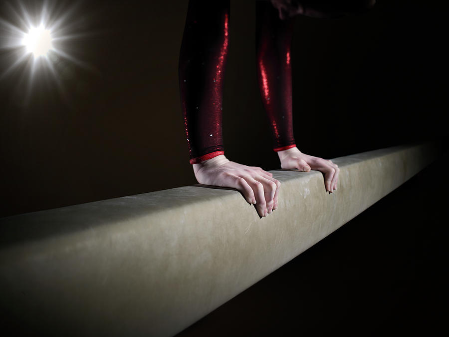 Female Gymnast On Balancing Beam #3 Photograph by Mike Harrington