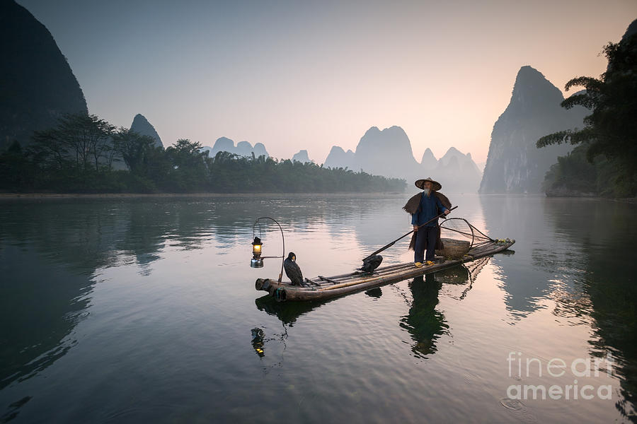 Fisherman with cormorants on the Li river near Guilin China #5 Photograph by Matteo Colombo