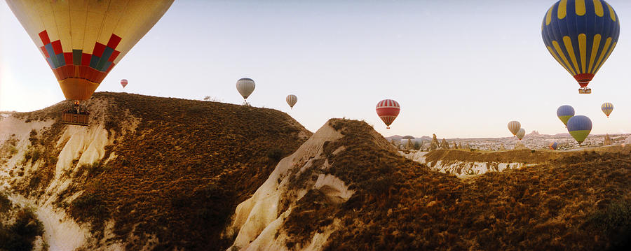 Transportation Photograph - Hot Air Balloons Over Landscape #3 by Panoramic Images
