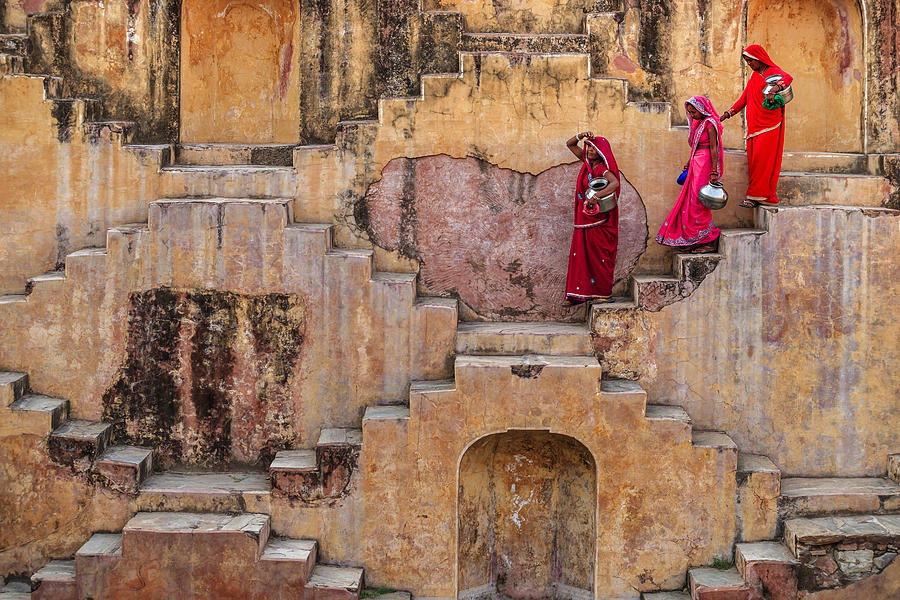 Indian women carrying water from stepwell near Jaipur #3 Photograph by Hadynyah
