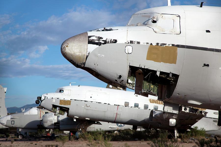 Military Aircraft In Salvage Yard Photograph by Jim West - Fine Art America