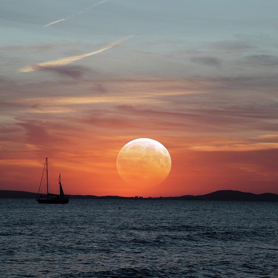 Moon Over The Ocean Photograph by Detlev Van Ravenswaay