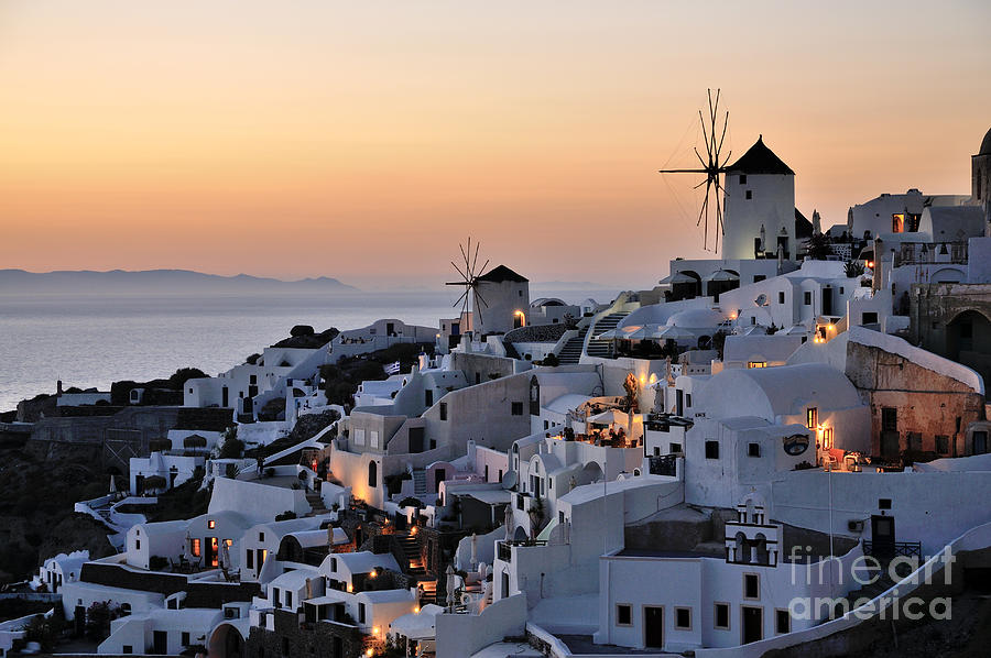 Greek Photograph - Oia town during sunset #2 by George Atsametakis