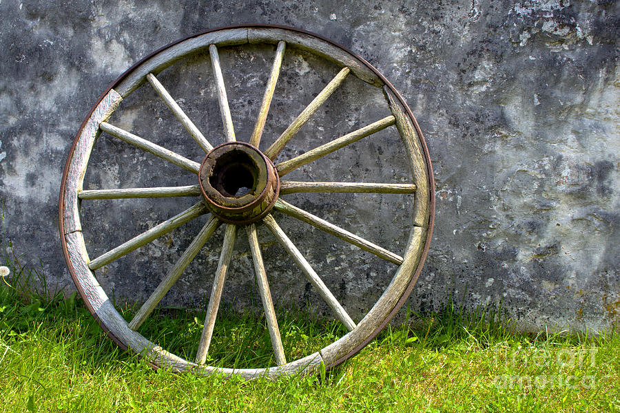 Wagon Photograph - Antique Wagon Wheel by Olivier Le Queinec