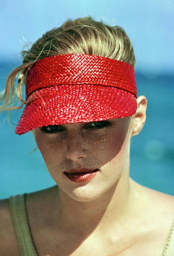 Patti Hansen Wearing A Red Visor #5 Photograph by Arthur Elgort