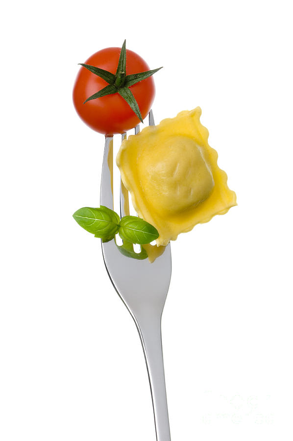 Ravioli Pasta Tomato And Basil On Fork Against White Background #3 Photograph by Lee Avison