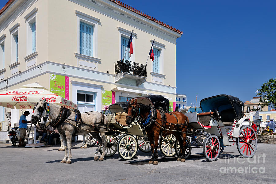 Horse carriages in Spetses town #1 Photograph by George Atsametakis