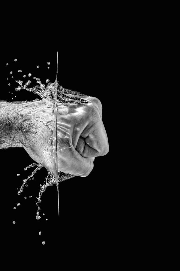 Splashing Fist #3 Photograph by Peter Lakomy