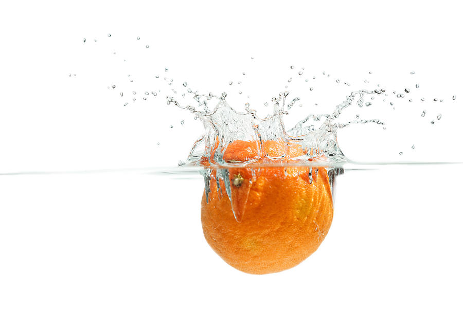 Splashing Orange #3 Photograph by Peter Lakomy