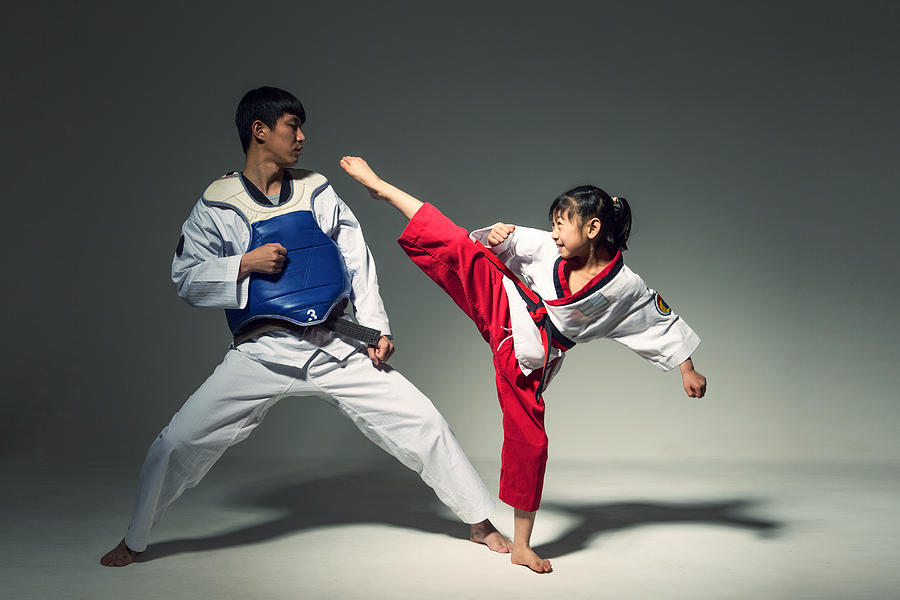 Teenagers doing martial arts, Tae Kwon Do #3 Photograph by Melodious Vision