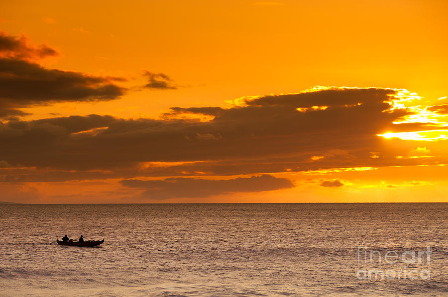 Two men paddling a Hawaiian outrigger canoe at sunset Maui Hawaii USA #3 Photograph by Don Landwehrle