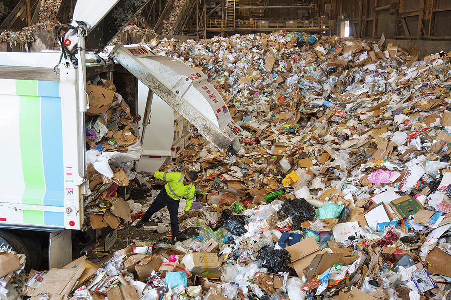 Waste Arriving At A Recycling Centre Photograph by Peter Menzel