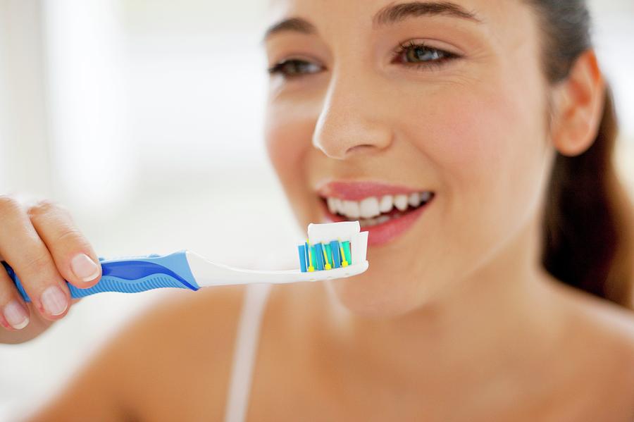 Woman Brushing Teeth Photograph by Ian Hooton - Fine Art America