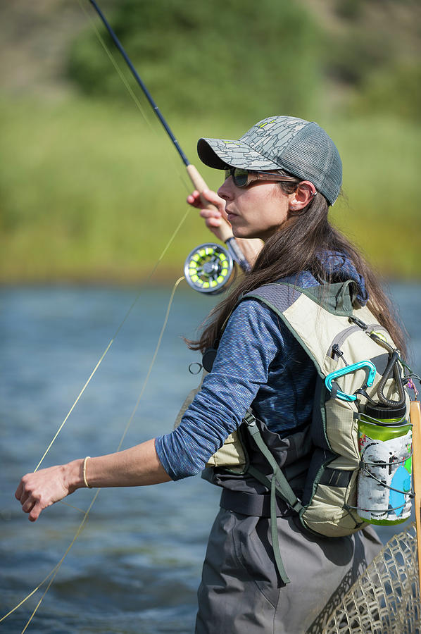 Woman Fishing In River, Colorado, Usa #3 Photograph by Jennifer Magnuson -  Pixels