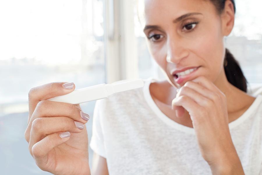 Woman Holding Pregnancy Test Photograph by Science Photo ...