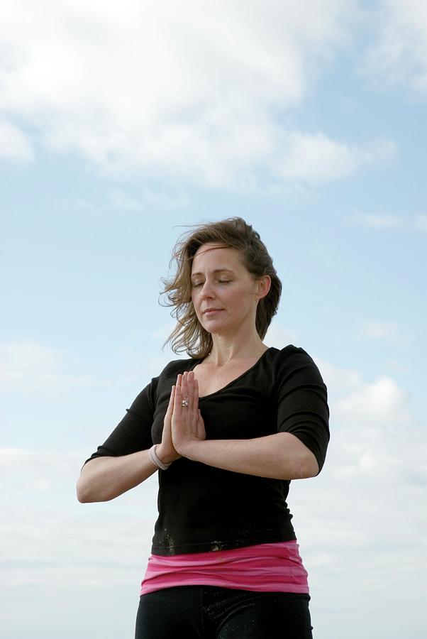 Woman Performing Yoga Exercise Photograph by Suzanne Grala/science ...