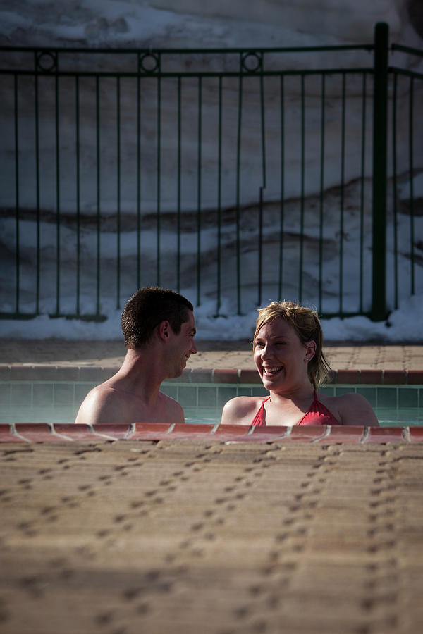 https://images.fineartamerica.com/images-medium-large-5/3-young-couple-relaxing-in-a-hot-tub-trevor-clark.jpg