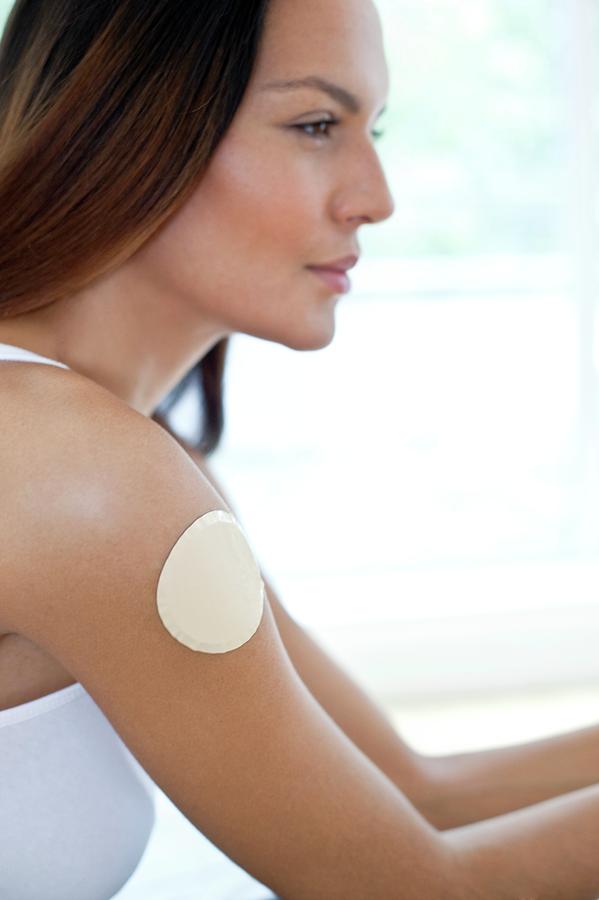 Young Woman Wearing Nicotine Patch #3 Photograph by Science Photo Library