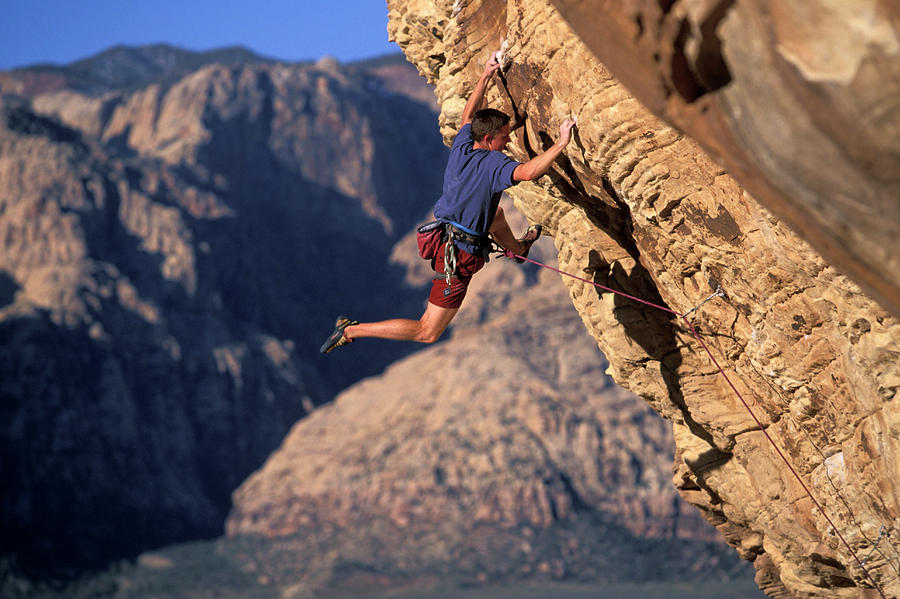 A Male Rock Climber Climbing Photograph By Corey Rich Fine Art America