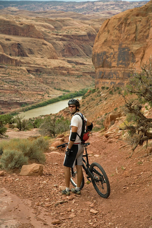Bicycle Photograph - A Man Mountain Biking In Moab, Utah #4 by Whit Richardson