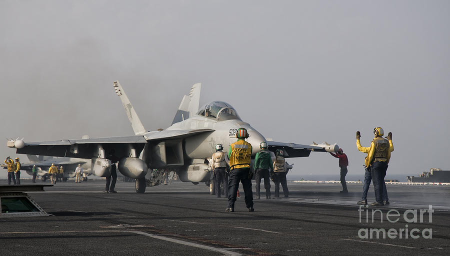 An Ea-18g Growler Is Guided Photograph