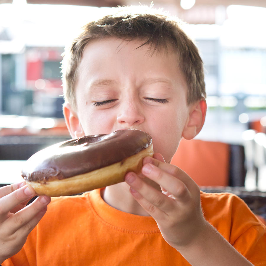 Cake Photograph - Boy with donut #4 by Tom Gowanlock