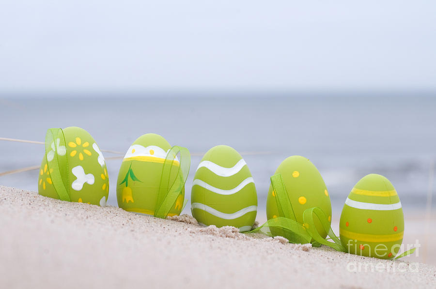 Easter decorated eggs on sand #4 Photograph by Michal Bednarek