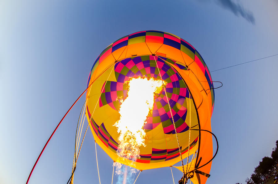 Fire heats the air inside a hot air balloon at balloon festival  #4 Photograph by Alex Grichenko