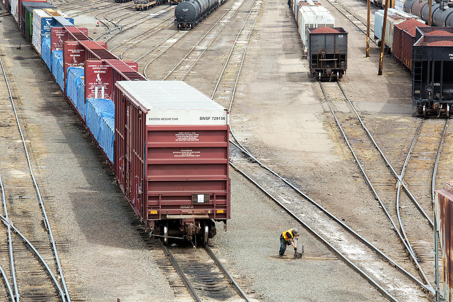 Freight Trains At A Rail Yard #4 Photograph by Jim West