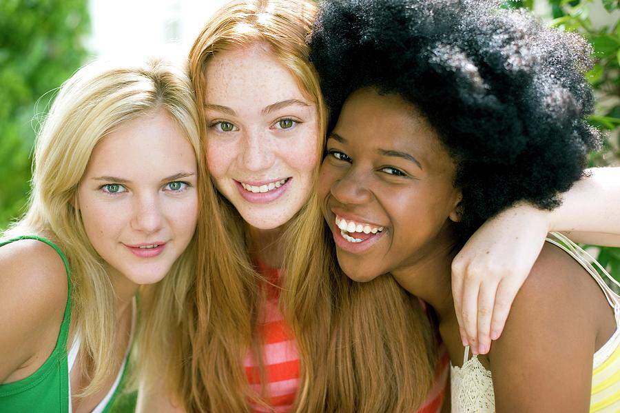 Touch friends. Group of teen girls laughing. White Race-friendly.