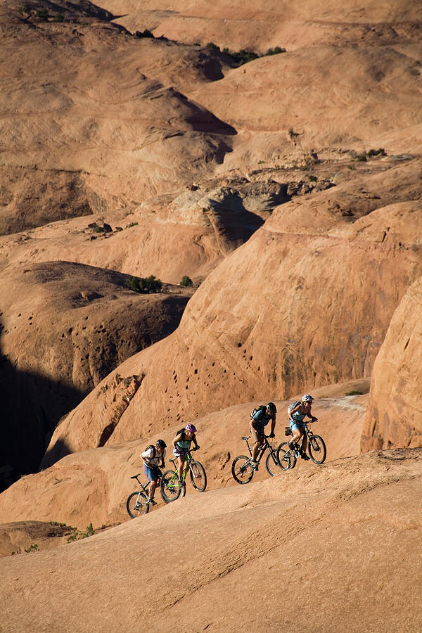 Bicycle Photograph - Group Mountain Biking, Moab, Utah #4 by Whit Richardson