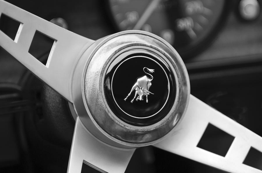 Black And White Photograph - Lamborghini Steering Wheel Emblem #4 by Jill Reger