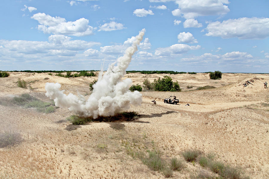 Large Explosion Near The Car Photograph by Oleg Zabielin - Fine Art America