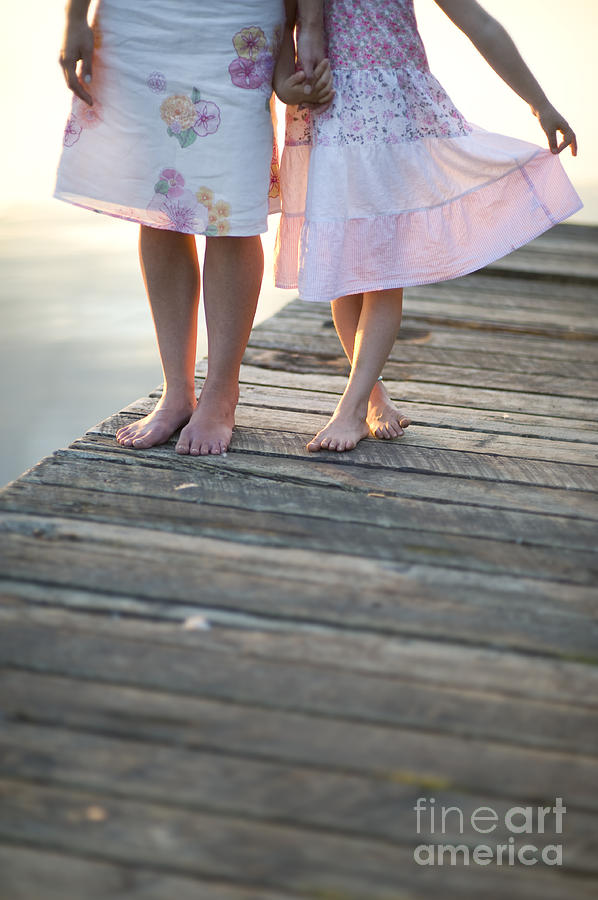 Mother And Daughter On A Wooden Board Walk #4 Photograph by Lee Avison