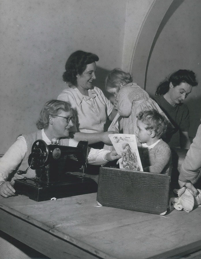 Mothers Take Their Babies To Dress Making Classes #4 Photograph by Retro Images Archive