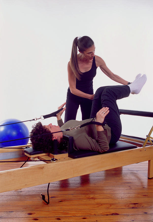 Pilates Exercise Photograph by Steve Percival/science Photo Library
