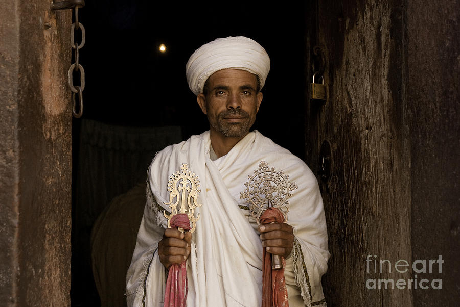 Priest holding cross at coptic church lalibella ethiopia africa #4 Photograph by JM Travel Photography