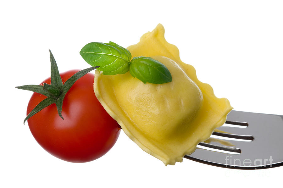 Ravioli Pasta Tomato And Basil On Fork Against White Background #4 Photograph by Lee Avison