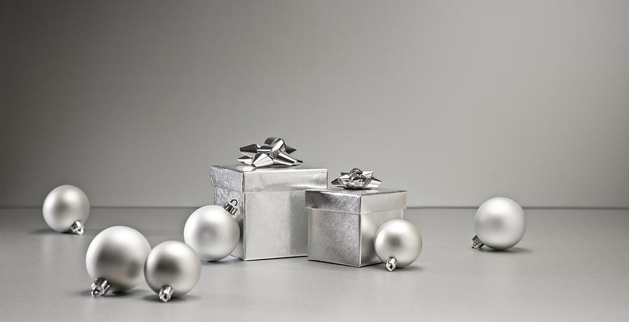 Silver bauble and present #4 Photograph by U Schade
